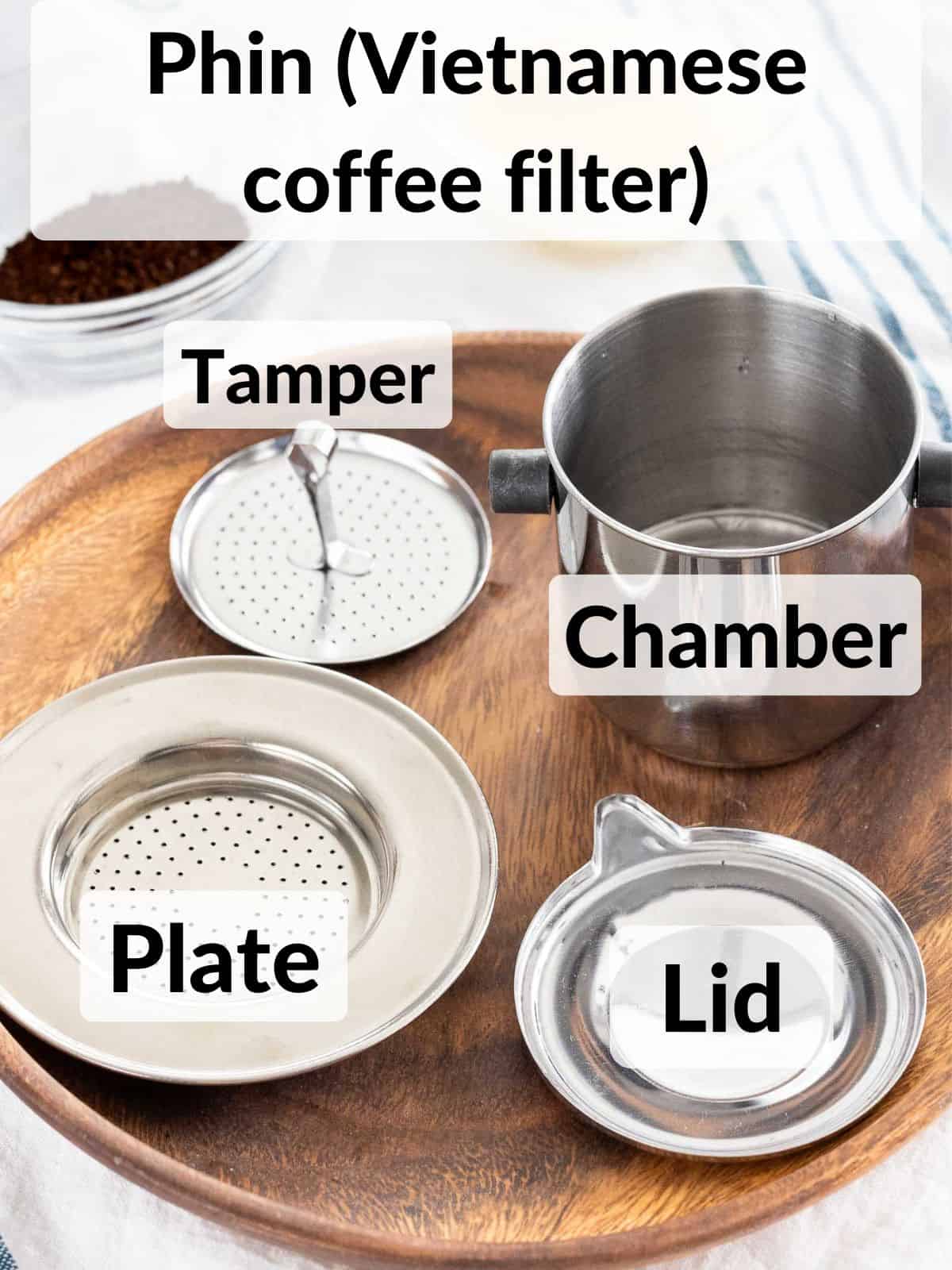 All parts of a phin filter or Vietnamese coffee filter.