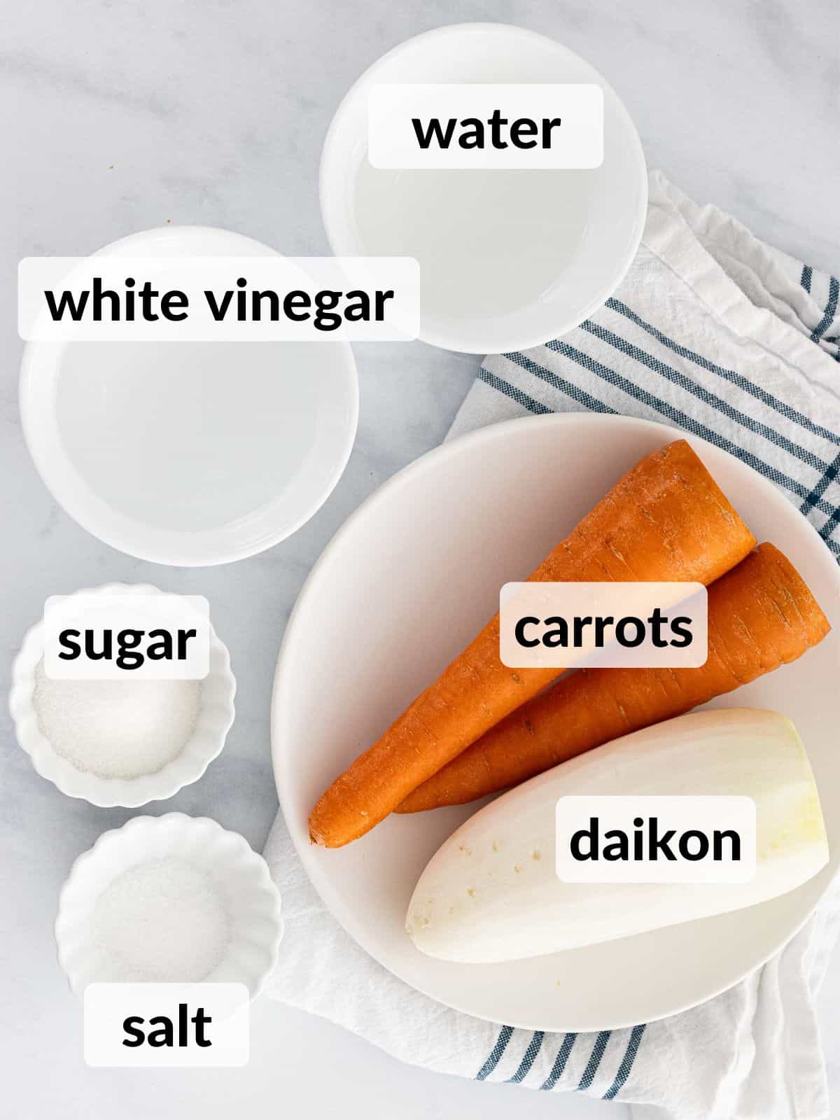 Ingredients for Vietnamese pickled carrots and daikon.