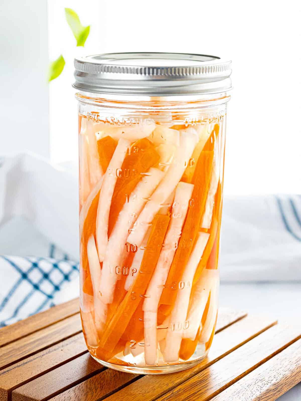 A jar of Vietnamese pickled carrots and daikon or do chua.